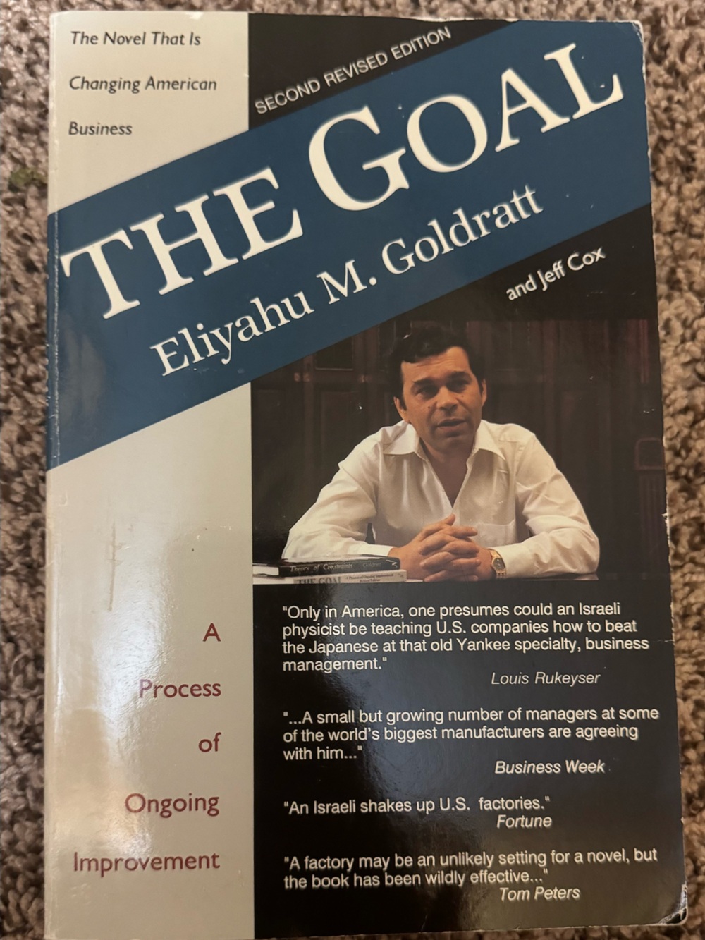 The Goal by Eliyahu M. Goldratt - Blue & White Paperback